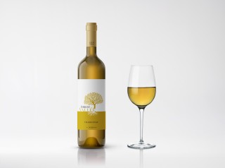 A bottle of Forest Vallée wine and a wine glass